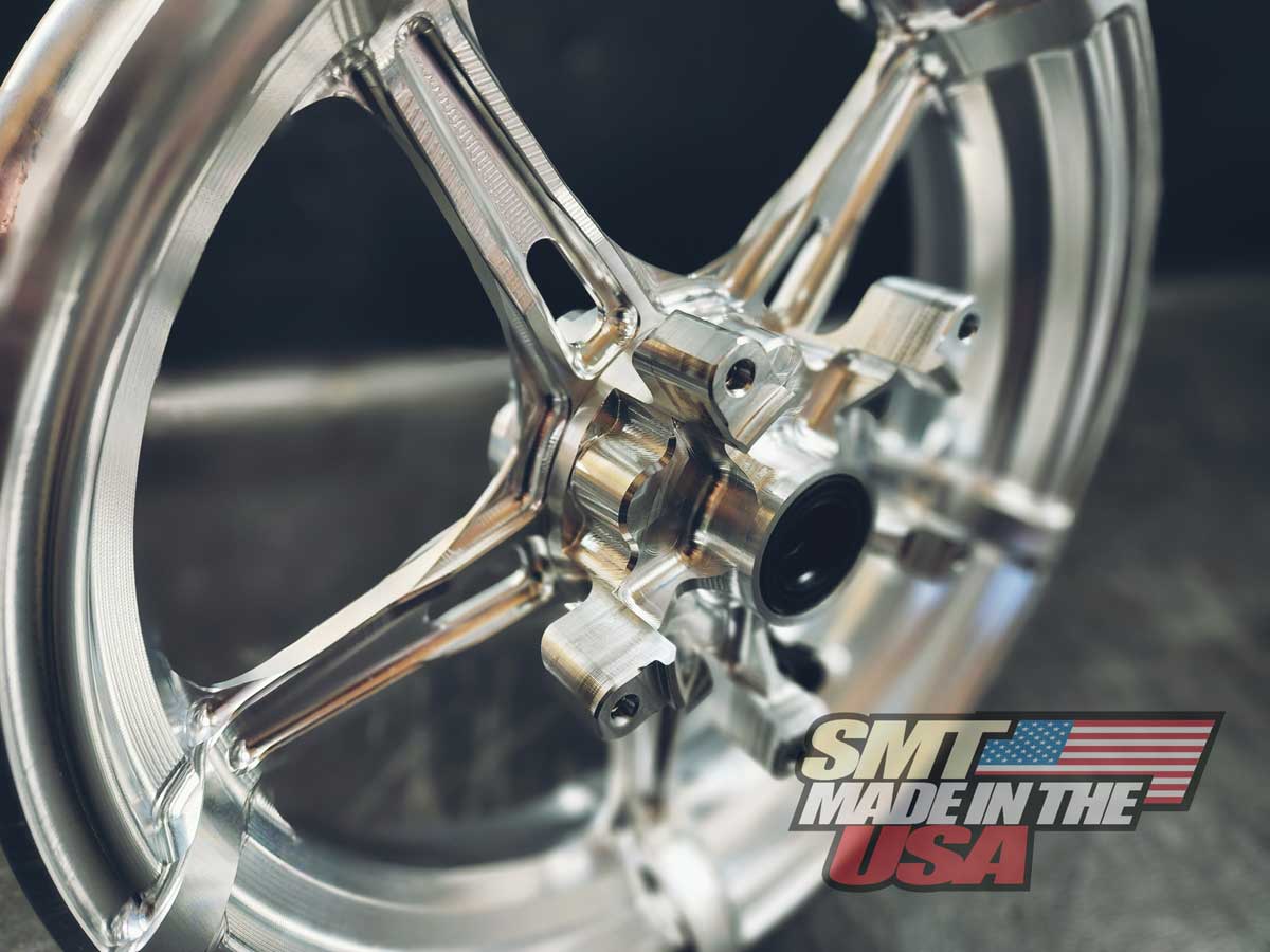 Small bore custom motorcycle wheel with machined finish