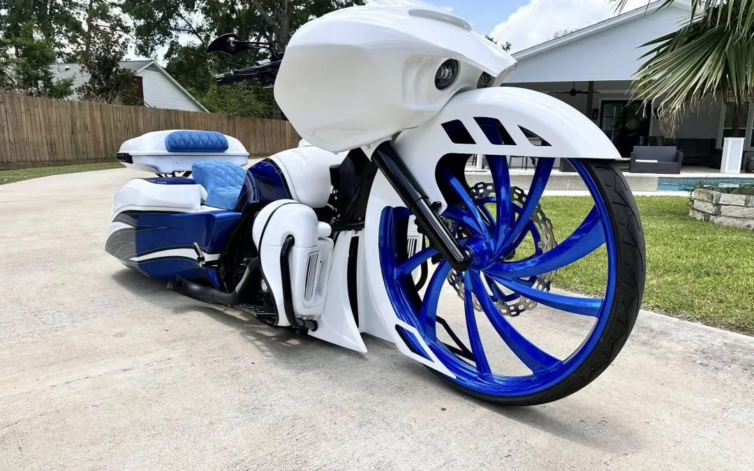 Oversized custom motorcycle wheel showcasing large front rim fitment