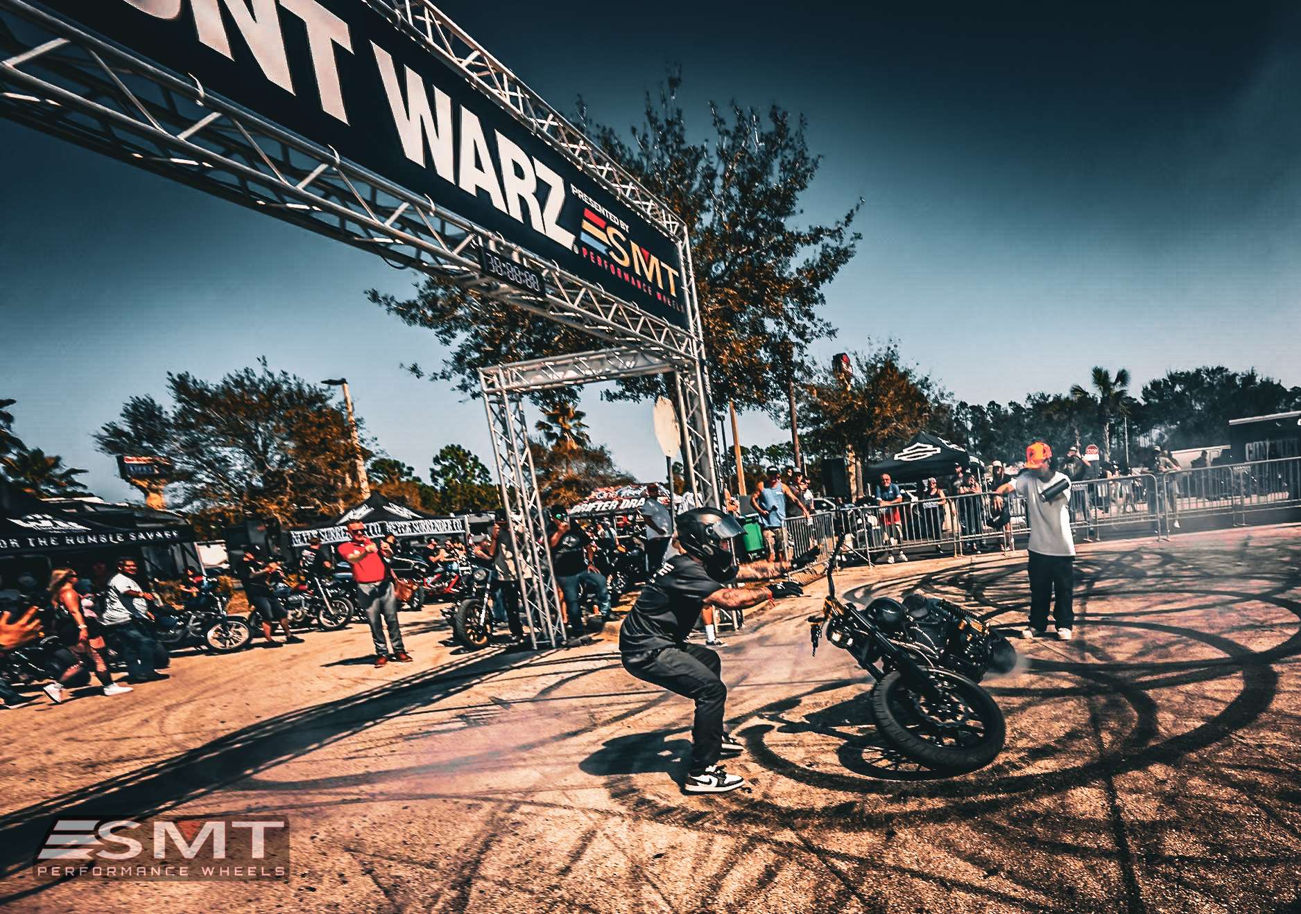 motorcycle stunt event crowd live performance